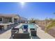 Spacious backyard with refreshing pool and comfortable seating at 1866 N 214Th Ln, Buckeye, AZ 85396