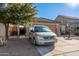 Single-story home with a two-car garage and desert landscaping at 18927 N Leland Rd, Maricopa, AZ 85138