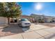 Single-story home with a two-car garage and desert landscaping at 18927 N Leland Rd, Maricopa, AZ 85138