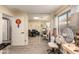 Home office with mirrored closet and built-in desk at 18927 N Leland Rd, Maricopa, AZ 85138