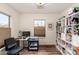 Home office with built-in shelving and desk area at 18927 N Leland Rd, Maricopa, AZ 85138