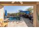 Inviting backyard oasis with a sparkling pool and pergola at 18927 N Leland Rd, Maricopa, AZ 85138