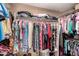 Large walk-in closet with ample hanging space and shelving at 18927 N Leland Rd, Maricopa, AZ 85138