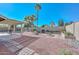 Relaxing backyard oasis with covered patio and mature plants at 19122 N 90Th Dr, Peoria, AZ 85382