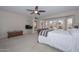 Bright bedroom with large windows and plush carpeting at 19122 N 90Th Dr, Peoria, AZ 85382