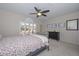 Guest bedroom with a comfortable bed and ample closet space at 19122 N 90Th Dr, Peoria, AZ 85382