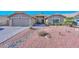 Single-story home with landscaped yard and two-car garage at 19122 N 90Th Dr, Peoria, AZ 85382