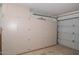 Garage with built-in storage cabinets at 19122 N 90Th Dr, Peoria, AZ 85382