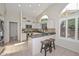 Spacious kitchen featuring a large island, stainless steel appliances, and recessed lighting at 19122 N 90Th Dr, Peoria, AZ 85382