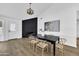 Modern dining room with dark wood table and fireplace at 1914 E Golden Ct, Chandler, AZ 85225