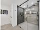 Modern shower with glass enclosure, dual shower heads, and subway tile at 1914 E Golden Ct, Chandler, AZ 85225