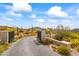 Private gated driveway leading to a luxurious estate home at 20646 N 112Th St, Scottsdale, AZ 85255