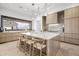 Gourmet kitchen boasting marble countertops, modern appliances, and abundant natural light at 20646 N 112Th St, Scottsdale, AZ 85255