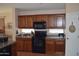 Well-equipped kitchen featuring ample wood cabinets and modern appliances at 2425 E Durango Dr, Casa Grande, AZ 85194