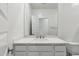 Bathroom with a vanity and a large mirror at 25624 N 154Th Ln, Surprise, AZ 85387