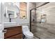 Updated bathroom with a walk-in shower and modern vanity at 25822 W Magnolia St, Buckeye, AZ 85326