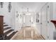 Bright entryway with tile floors and staircase at 25822 W Magnolia St, Buckeye, AZ 85326