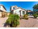 Two-story house with a landscaped yard and driveway at 25822 W Magnolia St, Buckeye, AZ 85326