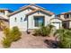 Two-story house with a landscaped yard and driveway at 25822 W Magnolia St, Buckeye, AZ 85326