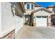 Two-story house with a double garage and front entrance at 25822 W Magnolia St, Buckeye, AZ 85326