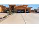 Three-car garage with ample space for parking and storage at 2837 N Whiting Cir, Mesa, AZ 85213