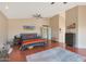 Main bedroom with hardwood floors, ceiling fan, and southwestern decor at 2837 N Whiting Cir, Mesa, AZ 85213