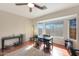 Home office featuring a desk, chair, and ample natural light at 2837 N Whiting Cir, Mesa, AZ 85213