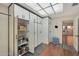 Well-organized storage room with open shelving and various containers at 2837 N Whiting Cir, Mesa, AZ 85213