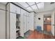 Storage room with built-in shelving and cabinets at 2837 N Whiting Cir, Mesa, AZ 85213