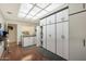 Storage room with built-in shelving and cabinets at 2837 N Whiting Cir, Mesa, AZ 85213