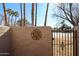 Backyard access through a wrought iron gate at 3013 W Phelps Rd, Phoenix, AZ 85053