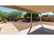 Covered patio overlooking a desert landscape backyard at 30573 N Royal Oak Way, San Tan Valley, AZ 85143