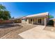 Backyard with covered patio and gravel landscaping at 30573 N Royal Oak Way, San Tan Valley, AZ 85143