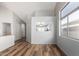 Open dining area with wood-look floors and view into living room at 30573 N Royal Oak Way, San Tan Valley, AZ 85143