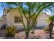 One-story home with attached garage and mature desert landscaping at 30573 N Royal Oak Way, San Tan Valley, AZ 85143