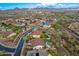 Aerial view showcasing a neighborhood of upscale homes with pools and desert landscape at 30773 N 129Th Ave, Peoria, AZ 85383