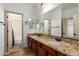 Double vanity bathroom with granite countertops at 30773 N 129Th Ave, Peoria, AZ 85383