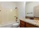 Bathroom with granite countertop, tub, and shower at 30773 N 129Th Ave, Peoria, AZ 85383