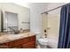 Bathroom boasts granite countertop, tub and shower at 30773 N 129Th Ave, Peoria, AZ 85383