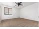 Spacious bedroom with carpeted floors and window coverings at 30773 N 129Th Ave, Peoria, AZ 85383