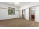 Well-lit bedroom with sliding door to closet at 30773 N 129Th Ave, Peoria, AZ 85383