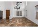 Elegant dining room with high ceilings and tile floors at 30773 N 129Th Ave, Peoria, AZ 85383