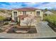 Two-story house with tile roof, landscaped yard, and a three-car garage at 30773 N 129Th Ave, Peoria, AZ 85383