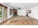 Spacious living room with a stone fireplace and tiled floors at 30773 N 129Th Ave, Peoria, AZ 85383