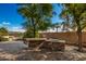 Built-in outdoor kitchen with stone countertops at 30773 N 129Th Ave, Peoria, AZ 85383