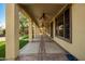 Long covered patio with multiple ceiling fans at 30773 N 129Th Ave, Peoria, AZ 85383