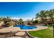 Resort-style pool with waterfall and spa features at 30773 N 129Th Ave, Peoria, AZ 85383