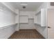 Bright walk-in closet with ample shelving and hanging space at 30773 N 129Th Ave, Peoria, AZ 85383