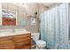 Clean bathroom with a shower/tub combo and updated vanity at 3136 W Sunnyside Ave, Phoenix, AZ 85029