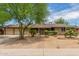 Ranch style home with landscaped yard and two-car garage at 3136 W Sunnyside Ave, Phoenix, AZ 85029